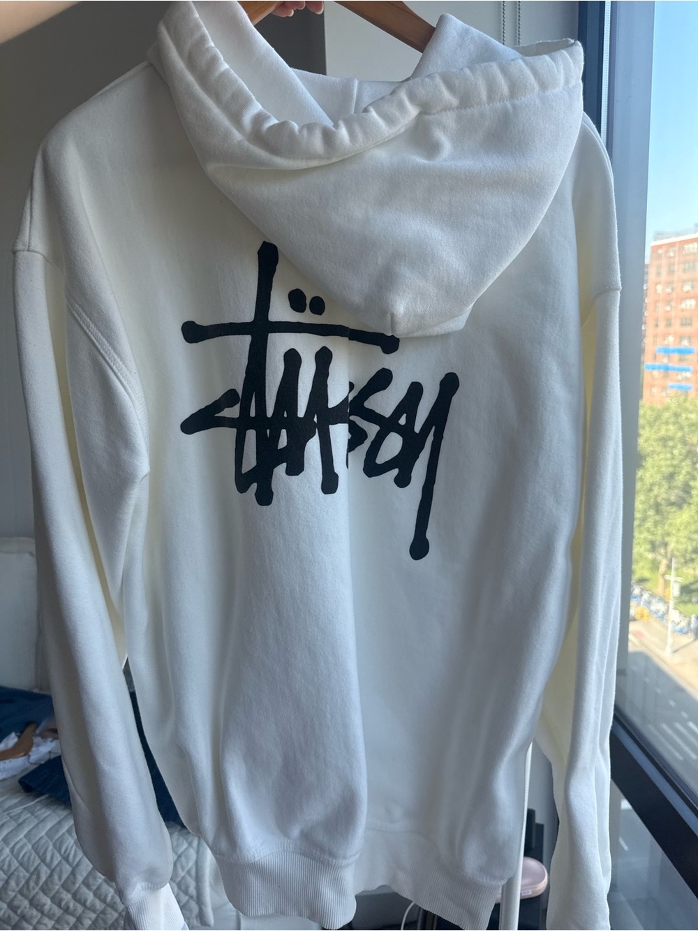 Stussy White Hoodie with Black Tag Detail